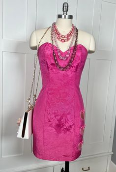 "Faviana PM New York Brand 51% Acetate/49% Cotton Size 7/8 Label Vintage 1990's Hot Pink AMAZING condition!  Features a sweetheart neckline, a super mini-length cut, a handful of sequin hearts down the hip, and a boned bodice.  Zipper back, no stretch. Measurements: 34\" Bust 28\" Waist 38\" Hips 30.5\" Total Length (from top of bodice to bottom hem) (Modeled on a Size 10 Mannequin) Accessories (necklace/purse) not included." Fitted Mini Dress With Heart-shaped Neckline For Evening, Formal Fitted Mini Dress With Heart-shaped Neckline, Holiday Wedding Mini Dress With Sweetheart Neckline, Holiday Cocktail Mini Dress With Sweetheart Neckline, Formal Mini Dress With Fitted Bodice And Heart-shaped Neckline, Pink Mini Dress With Heart-shaped Neckline For Party, Formal Mini Dress With Heart-shaped Neckline And Fitted Bodice, Pink Mini Dress For Formal Holiday Events, Spring Party Mini Dress With Heart-shaped Neckline