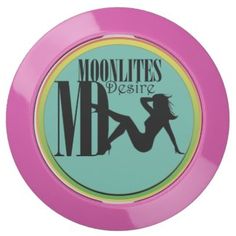 a pink frisbee with the words moonlits desire on it's side