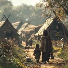 a woman and child walking down a dirt road