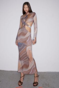 The cut-out maxi dress features a long adjustable waistband, open back, and thumb holes, made from a soft natural fabric that ensures a comfortable fit. Each item is unique, so please note that coloration may vary. YASPIS is a contemporary brand that showcases the deep connection between humans and nature through its prints and shapes. Shop now at doors.nyc and #supportsmallbusiness Fitted Maxi Dress With Cutout, Fitted Cutout Maxi Dress, Beach Maxi Dress With Cut-out Waist, Fitted Maxi Dress With Cut-out Waist For Beach, Humans And Nature, Natural Fabric, Elastic Fabric, Adjustable Waistband, Nyc Fashion