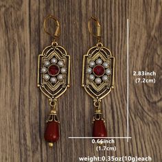 SPECIFICATIONS Material: Metal Metals Type: zinc Alloy Item Type: EARRINGS Style: Vintage Earring Type: drop earrings Shape\pattern: Water Drop Fine or Fashion: fashion Gender: Women Choice: yes Bohemian Alloy Earrings For Festivals, Vintage Red Dangle Chandelier Earrings, Red Vintage Dangle Chandelier Earrings, Red Vintage Chandelier Dangle Earrings, Red Metal Dangle Earrings, Red Beaded Drop Earrings With Latkans, Red Metal Earrings With Latkans, Red Metal Drop Earrings, Red Brass Drop Earrings