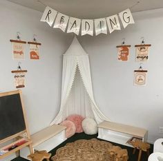 a child's playroom with toys and decorations on the walls, including a bed