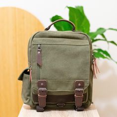 Dimensions: 13" H x 11.4" W x 4.3" D Shipped in biodegradable, plastic-free, and eco-friendly packaging Be comfortable the way you want, with our unique design that transforms a backpack into a crossbody. The durable high-quality canvas material is built to withstand daily wear and tear, while the spacious main compartment and multiple pockets provide ample space for all your essentials. A versatile, trendy, and stylish bag that's perfect for any daily adventure. It boasts vintage styling with l Backpack Vintage, Vintage Styling, Charm School, Biodegradable Plastic, Convertible Backpack, Stylish Bag, Backpack Purse, Bag Shoulder, Small Bag