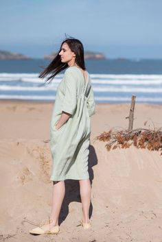 Linen Dress Motumo 16S6 by MotumoLinen on Etsy Spring Tunic Dresses In Ramie, Spring Ramie Tunic Dress, Beach Midi Linen Dress, Green Relaxed Fit Linen Beach Dress, Spring Linen Dress With Natural Dye, Summer Linen Tunic Dress, Long Sleeve Dresses With Natural Dye For Summer, Summer Linen Tunic Midi Dress, Spring Tunic Dress With Natural Dye