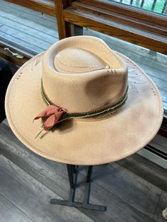 Discover the rugged charm of our Burned Western Hat. This unique, handcrafted cowboy hat features a distressed look, giving it a vintage, well-worn appeal perfect for Western enthusiasts and fashion-forward individuals. Features: Handcrafted Design: Each hat is meticulously burned and distressed to achieve a one-of-a-kind look. Premium Materials: Made from high-quality materials for durability and comfort. Unique Aesthetic: The burned finish adds a distinctive vintage style that sets it apart. B Handmade Rustic Fedora For Kentucky Derby, Rustic Adjustable Felt Hat For Kentucky Derby, Rustic Style Hat Bands For Kentucky Derby, Handmade Country Style Hat Bands For Kentucky Derby, Rustic Brimmed Hat Band For Kentucky Derby, Rustic Felt Hat For Kentucky Derby And Country Events, Rustic Felt Hat For Kentucky Derby, Rustic Fedora For Kentucky Derby, Rustic Wide Brim Felt Hat For Country Events