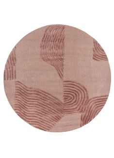 a round rug with wavy lines in pink and brown on the bottom, along with a white background