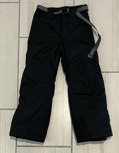 Columbia Kids Youth Ski Snow Pants Size 6/7 Black Adjustable Waist. It is in good used condition. They have a tiny rip at the waist. Please see pictures for more details. Waist- 11.75” Rise- 9.5” Inseam- 21” Snow Pants, Parachute Pants, Columbia, Skiing, Size 6, Pants, Black, Trousers