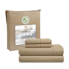 the sheet set is beige and has four pillows