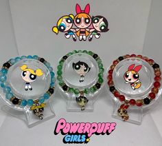 Handmade Powerpuff girls bracelets 🌟 ~ beaded by me, please handle with care. ~Extremely durable (All bracelets are double banded) ~Perfect gift for friends 🫶🏾 ~ more on my instagram @braceletsbychi Green Novelty Bracelets With Round Beads, Themed Green Beaded Bracelets For Gifts, Themed Green Beaded Bracelets As Gift, Green Themed Beaded Bracelets As Gifts, Themed Beaded Bracelets With Round Beads As Gift, Cartoon Bracelet, Bracelets Matching, Power Puff Girls, Bracelets Beaded