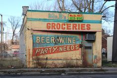 an old building has been painted yellow and blue with the word crockies on it