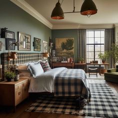 a bedroom with green walls, plaid bedding and two lamps hanging from the ceiling