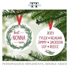 two personalized christmas ornaments hanging on a tree branch with the names of their respective guests