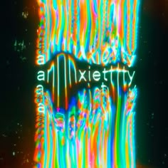 an advertisement with neon colors on the side of a building that says, allixetity