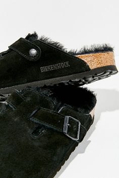 So cozy we can't believe these suede clogs from Birkenstock. Birkenstock Boston clogs are the coziest clog around with a soft suede upper lined in fluffy shearling with an adjustable buckled strap across arch and a cushy EVA sole. Features Birkenstock Boston shearling clogs Cozy Birkenstock shoes Suede clogs with soft shearling lining Cork latex footbed with arch support Easy slip-on Birkenstock clogs Content + Care Suede, shearling, EVA Spot clean Imported Size + Fit Birkenstock narrow A-B widt Winter Suede Clogs With Textured Footbed, Winter Clogs With Suede Lining And Comfortable Style, Winter Comfortable Clogs With Suede Lining, Winter Clogs With Suede Lining, Winter Shearling Mules, Winter Shearling Clogs With Cushioned Footbed, Comfortable Mules With Leather Footbed For Winter, Comfortable Winter Clogs With Faux Fur Lining, Shearling Clogs