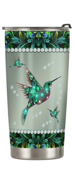 a metal cup with a hummingbird design on it