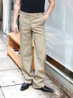 Vintage 90s trousers in dark beige color & high rise fit Made of cotton & viscose Size: W30L34 Zipper fly *VINTAGE CONDITION: 9/10 MEASUREMENTS (cm/in) - Waist perimeter: 77cm / 30in - Hips perimeter: 100cm / 39in - Inseam: 85cm / 34in - Rise: 30cm / 11.5 - Length: 110cm / 43in for more measurements if needed please contact me through etsy messages or via instagram * all clothes are categorized from 1 to 10 considered their vintage condition. 10/10 corresponds to deadstock item, 9/10 to used ite Khaki Fitted Full-length Bottoms, Fitted Beige Chinos, Fitted Full-length Khaki Bottoms, Fitted Full Length Khaki Bottoms, Fitted Full-length Beige Chinos, Fitted Full Length Beige Chinos, Classic Khaki Full Length Bottoms, Classic Khaki Bottoms, Classic Full-length Khaki Pants