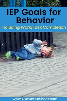 a young boy laying on the ground next to a fence with text overlay that reads iep goals for behavior including work / task completion