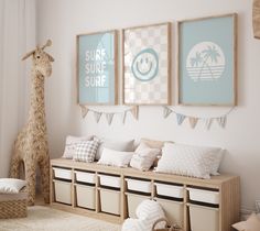 a room filled with lots of furniture and pictures on the wall next to a stuffed giraffe