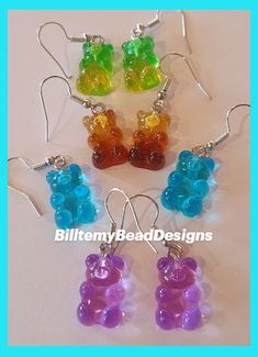 four different colors of gummy bear earrings