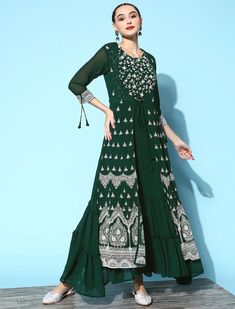 * Women Lovely Green Georgette Fluid Tie-Up Ethnic Dress * Dress Details:- * Green floral embroidered a-line dress * Round neck * Three-quarter, regular sleeves * Embroidered detail * Maxi length in flared hem * Georgette fabric *Fabric:- Georgette  *Wash Care:- Hand wash AVAILABLE IN 7 SIZES THEY ARE IN FOLLOWING MEASUREMENTS IN INCHES:- XXS:- Bust-32/To Fit Waist-26/Length-50/Hip-36 XS:- Bust-34/To Fit Waist-28/Length-50/Hip-38 S:- Bust-36/To Fit Waist-30/Length-50/Hip-40 M:- Bust-38/To Fit Wa Floor-length Dresses With Resham Embroidery For Transitional Season, Bohemian Floor-length Dress With Cutdana, Floor-length Dresses With Intricate Embroidery For Navratri, Traditional Embroidered Maxi Dress For Designer Wear, Festive Anarkali Embroidered Maxi Dress, Navratri Embroidered Straight Kurta Dress, Embroidered Semi-stitched Maxi Dress For Festive Occasions, Anarkali Embroidered Semi-stitched Maxi Dress, Floor-length Dresses With Intricate Embroidery For Diwali