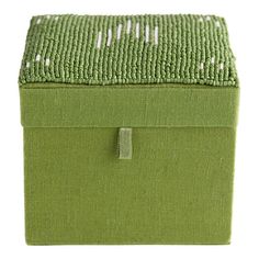 a green box with white dots on it