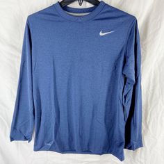 Brand New With Tags! Light Blue Crew Neck Sports Top, Navy Moisture-wicking Crew Neck Top, Light Blue Crew Neck Sport Top, Navy Crew Neck Top With Moisture-wicking, Blue Cotton Moisture-wicking Shirt, Nike Blue Crew Neck T-shirt, Nike Long Sleeve Moisture-wicking T-shirt, Nike Blue Crew Neck Shirt, Blue Long Sleeve Moisture-wicking T-shirt