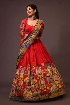 Red attached cancan lehenga with ajantha concept kalamkari hand painted patterns. Paired with  padded red blouse embroidered with glass beads and green hand painted dupatta with contrast border. - Aza Fashions Kalakari Blouses Design, Gathered Lehenga, Painted Dupatta, Cape Lehenga, Cancan Lehenga, Kurta Lehenga, Lehenga Pattern, Painted Patterns, Shivaji Maharaj