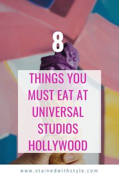 a person holding up a purple ice cream cone with the words 8 things you must eat at universal studios hollywood