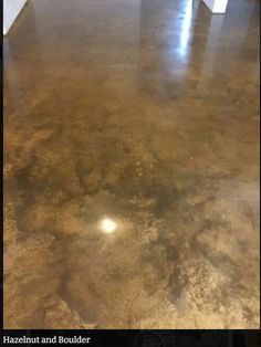 an image of a concrete floor that looks like it has been stained and is ready to be polished