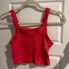 Never Worn Perfect Condition Coral Red Color Red Cropped Stretch Tank Top, Red Stretch Cropped Tank Top, Stretch Red Cropped Tank Top, Red Crop Top For Summer Workout, Red Summer Workout Crop Top, Summer Red Workout Crop Top, Seamless Cropped Red Crop Top, Seamless Red Cropped Crop Top, Red Seamless Crop Top Tank