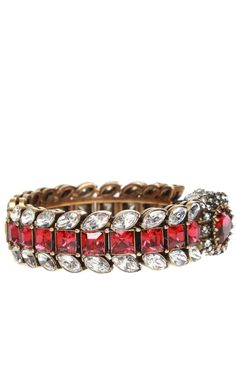 Gold-tone bracelet with a snake motif from Gucci. Encrusted with decorative elements in silver-tone and red.Structured designGold-tone metal and crystal embellishments.Composition: Crystal, MetalWidth: 0.8"Designer Style ID: 596004I4769Made in Italy Designer Metal Bangle Bracelets, Gucci Jubilee Bracelet For Formal Occasions, Gucci Jewelry With Jubilee Bracelet For Formal Occasions, Designer Bangle Bracelet For Party, Luxury Jeweled Bangle Bracelets, Silver Gucci Jewelry For Party, Luxury Bangle Bracelets For Festive Occasions, Designer Gucci Jewelry For Party, Jeweled Bangle Bracelets For Evening