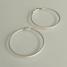 Our Cleopatra Silver Hoops earrings are sure to make a bold statement! These 50mm, silver matte hoops will give your look a sophisticated and chic vibe thanks to the timeless style of the hoop! Perfect to make any outfit pop like royalty, you'll be making heads turn with these bad boys! 1 3/4" in diameter Silver Hoops Earrings, Hoops Earrings, Silver Hoops, Silver Hoop Earrings, Timeless Style, Timeless Fashion, Royalty, Hoop Earrings, Silver