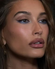 The Coolest Summer 2023 Makeup Looks to Try Right Now How To Shimmer Eyeshadow, Hailey Bieber Blue Eyeliner, Blue Eyeshadow For Blue Eyes, Eras Makeup, Coachella Make-up, Hayley Bieber, Coachella Makeup, Blue Makeup Looks, Summer Makeup Looks