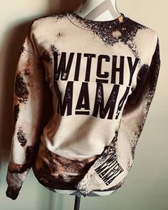 Witchy Mama Sweatshirt Unisex sizing S-2XL TAT: 7-14 business days Unleash your inner witchy mama with this one-of-a-kind crewneck sweater. Each sweater is handcrafted and bleach washed for a unique look. No two are alike, just like you! Perfect for adding some playful witchiness to your wardrobe. Hand Dyed Cotton Sweatshirt For Fall, Fall Acid Wash Grunge Sweatshirt, Oversized Bleached Sweatshirt For Fall, Bleached Crew Neck Tops For Fall, Fall Crew Neck Bleached Sweatshirt, Hand Dyed Crew Neck Top For Fall, Fall Grunge Bleached Tops, Witchy Mama, Urban Hippie