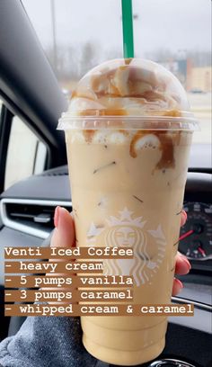 someone holding up a cup of coffee in their hand with the caption'ventti iced coffee - heavy cream, 5 pumps vanilla, 3 cups caramel, whipped cream &