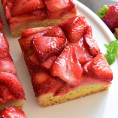 slices of strawberry cake on a white plate