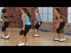 a group of women doing exercises in a gym