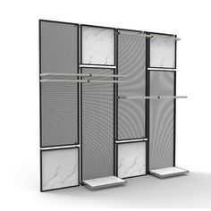 a white and black room divider with marbled panels on the sides, along with shelves