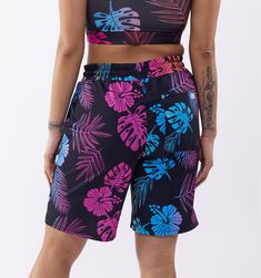 The Swim 9” Lined Board Short is a new-longer cut of our favorite 7” board short featuring a new contrasting swim liner. Styled like bike shorts-meet-board-meet-beach, this look is layered and playful. Shell: 98% recycled polyester; 2% spandex OEKO-TEX®-certified fabric Lining: 88% polyester; 12% spandex 2-in-1 with full fitted short liner in black Drawstring no-roll elastic waist Machine wash cold, Machine dry low temperature or hang dry UV Protection, UPF 50 Recycles 8 plastic water bottles in Athleisure Swim Trunks With Built-in Shorts For Surfing, Tropical Multicolor Surfing Shorts, Tropical Multicolor Swim Trunks With Built-in Shorts, Tropical Swim Trunks With Built-in Shorts For Surfing, Tropical Short Swimwear For Surfing, Tropical Short Length Swimwear For Surfing, Tropical Multicolor Short Swim Trunks, Tropical Style Swim Trunks With Built-in Shorts, Tropical Short Swimwear For Sports