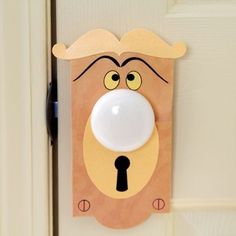 a door handle with a cartoon face on it