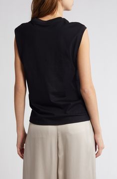 Give your layering technique a little muscle with this sleeveless T-shirt in smooth, soft Supima cotton. 23" length (size Medium) Crewneck Sleeveless 100% cotton Machine wash, tumble dry Imported Casual Sleeveless Modal Tops, Black Cotton Muscle Tee For Layering, Black Modal Tops For Spring, Spring Black Modal Top, Chic Black Sleeveless T-shirt, Chic Cotton Muscle Tank Tee, Black Modal Tops For Summer, Cotton Tank Top For Workwear, Black Modal Tank Top