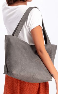 ▼Designer Tote Bag | Shiri Tote This Designer Tote Bag is perfect for any stylish woman! It's made from the finest full grain high-quality Italian leather, and comes in various colors to match your personal style.The spacious interior of this tote will protect all of your essentials. Plus it features two pockets inside to keep everything secure no matter what it is!A designer tote bag is the perfect everyday bag! It's big enough to fit everything you need, but not so much that carrying it around Rectangular Textured Leather Hobo Bag For Travel, Leather Minimalist Hobo Bag For Travel, Everyday Textured Leather Satchel Backpack, Everyday Textured Leather Satchel Weekender Bag, Minimalist Leather Hobo Bag For Travel, Modern Bags With Leather Handles In Recycled Leather, Modern Bags With Leather Handles And Recycled Leather, Modern Textured Leather Bags For On-the-go, Rectangular Hobo Bag For Travel With Smooth Grain