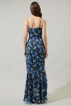 Feel like a queen in the Lyssa Floral Doris Ruffle Maxi Dress! Features an asymmetrical side with a split neckline, spaghetti straps, and a wrapped bodice. A high waist tops a flouncy, ruffle maxi skirt. Wear your black strappy heels to go along. - Ruffle- Sleeveless- Asymmetrical- Zipper- Color: Blue MultiSize + Fit - Model is 5'8" and wearing size XS- Measurements taken from size S - Chest: 13 1/4"- Length: 55" Fabric Self: 100% Polyester, Lining: 97% Polyester 3% Spandex Style Number STD14201 Blue Bias Cut Maxi Dress For Prom, Fitted Maxi Dress With Floral Print And Asymmetrical Neckline, Fitted Blue Maxi Dress With Bias Cut, Blue Dress With Ruffles And Asymmetrical Neckline, Fitted Blue Bias Cut Maxi Dress, Blue Midi Length Dress With Bias Cut, Blue V-neck Bias Cut Maxi Dress, Fitted V-neck Evening Dress With Floral Print, Sleeveless Blue Bias Cut Dress