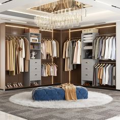 a walk in closet filled with lots of clothes and shoes next to a chandelier