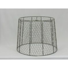 a chicken wire basket on a white background