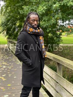 Lovely African print scarf to stay warm during this fall / winter. * Consists of one thick warm anti-pilling fleece layer and one layer of African print fabric (100% cotton) * Adult size: Approximate dimensions: 180cm x 55cm ( 70 inch x 21 inch ) * Washable at 40 degrees celcius * Unisex Black Cotton Scarves For Winter, Black Cotton Scarf For Winter, Black Cotton Winter Scarf, Black Cotton Casual Scarves, Casual Black Cotton Scarves, Casual Black Cotton Scarf, Brown Cotton Scarves For Fall, Cotton Scarves For Fall, Casual Cotton Scarves For Winter