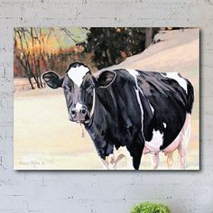 a painting of a black and white cow standing in the snow with trees behind it