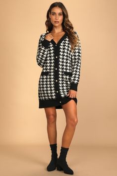 Lulus Exclusive! Look like a fashion icon in the Lulus x LUSH Truly Iconic Black and White Houndstooth Cardigan Sweater Dress! This hybrid cardigan-meets-dress is composed of stretchy knit with a black and white houndstooth design that shapes a V-neckline and long sleeves. The shift silhouette has a faux pearl (in gold settings) button placket down the center and two decorative welt pockets before ending at a mini hem. Solid ribbed knit at the neck, cuffs, and hem. Fit: This garment fits true to Chic Plaid Cardigan With Long Sleeves, Chic Plaid Long Sleeve Cardigan, Chic Plaid Cardigan For Spring, Knee-length Cardigan For Fall, Long Sleeve Houndstooth Cardigan For Fall, Houndstooth Cardigan, Cardigan Sweater Dress, White Houndstooth, Comfortable Room