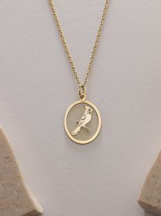 Gold Cardinal Bird Pendant - Bird Gold Necklace ● Material of pendant: Solid Gold 14k ( REAL GOLD ) ● Metal Stamp: 14k ( REAL GOLD ) ● The pendant is available in 5 sizes: - 12x17 mm / 0,47 x 0,66 inches - 13x18 mm / 0,51 x 0,70 inches  In the photos - 14x19 mm / 0,55 x 0,74 inches  - 16x21 mm / 0,62 x 0,82 inches  - 18x24 mm / 0,70 x 0,94 inches ( In the photos the size is 13x18 mm / 0,51 x 0,70 inches ) ( Jump Ring inner diameter: 4 mm ) ● Material of chain: Solid gold 14k ( REAL GOLD ) It is thin and dainty and it is available in 4 sizes: - 40 cm / 15,75 inches ( Length ) - 45 cm / 17,72 inches ( Length ) In the photos - 50 cm / 19,68 inches ( Length ) - 55 cm / 21,65 inches ( Length ) ● Backside engraving is FREE ( Please use the personalization box for that.) ● If you want larger size Gold Bird-shaped Jewelry With Bird Design, Yellow Gold Bird Design Pendant Jewelry, Bird Design Necklace Perfect For Gifts, Bird Design Necklace As A Gift, Bird Design Necklace For Gift, Bird-shaped Bird-design Necklace For Gifts, Bird Design Pendant Necklace As A Gift, Bird Design Pendant Necklace As Gift, Gold Pendant Necklace With Bird Design