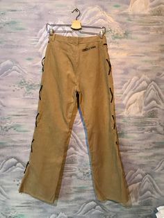 "Baggy Corduroy Pants Corduroy Trousers Boyfriend Pants Brown Sand Corduroy Pants Cowboy style pants Small Size Pants Label size: W32 ; L27 Measurements: (lying flat): Waist: 14\"- 35 cm Hips: 19\"- 48 cm Pant leg inseam: 31,5\" - 80cm Length: 41,5\" - 105 cm Please check measurements to insure a proper fit. Remember to allow yourself some extra room for movement. You can compare these with something from your closet that fits you well. This pants will come to you freshly laundered and ready to Vintage Corduroy Pants For Spring, Trendy Straight Leg Corduroy Pants, Trendy Corduroy Straight Leg Bottoms, Vintage High Waist Corduroy Pants, High Waist Vintage Corduroy Pants, Vintage High-waist Corduroy Pants, Vintage Corduroy Pants With Pockets, Baggy Corduroy Ankle-length Pants, Pantalon Boyfriend